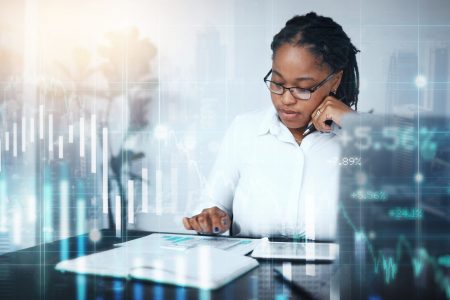 Finance, overlay or black woman with calculator for stock market, cryptocurrency or forex investment strategy. Financial, holographic or focused trader trading or working on data analysis paperwork.